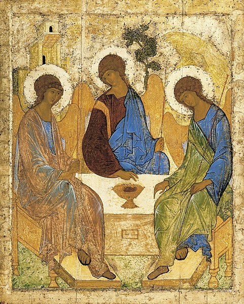 3 angels sitting around a table
