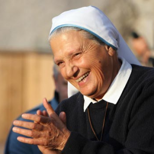 A nun with joy on her face