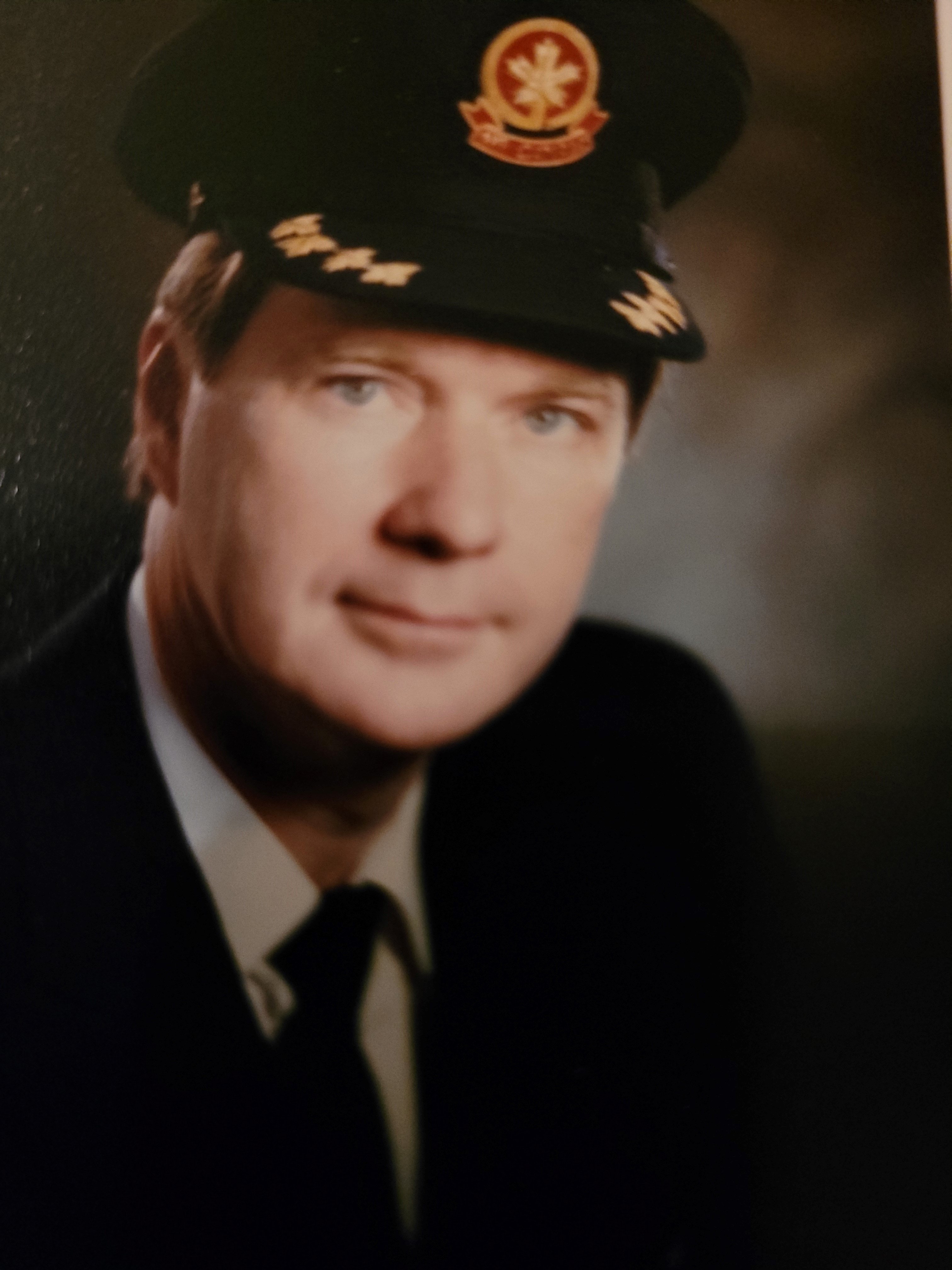 Man in air force uniform wearing a hat