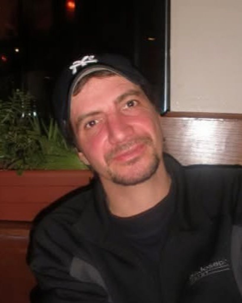 Smiling man with hat