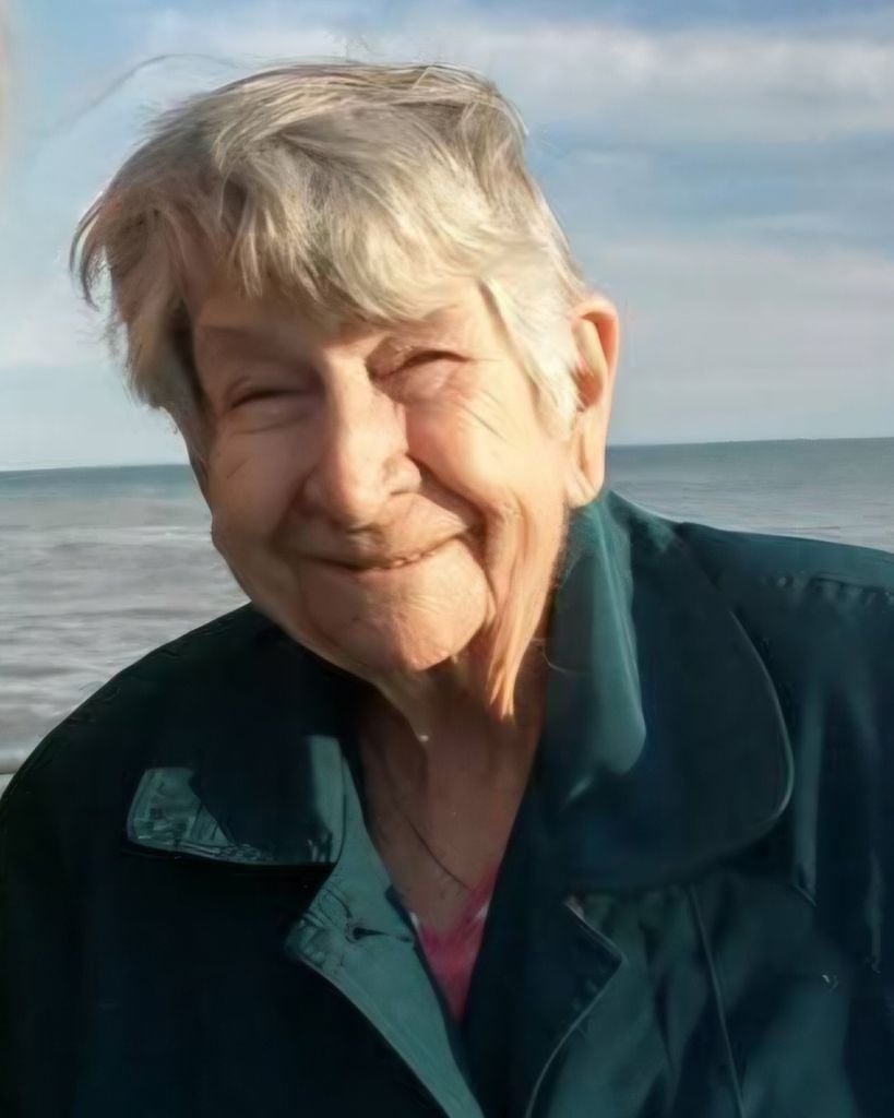 Older smiling woman in the sunshine