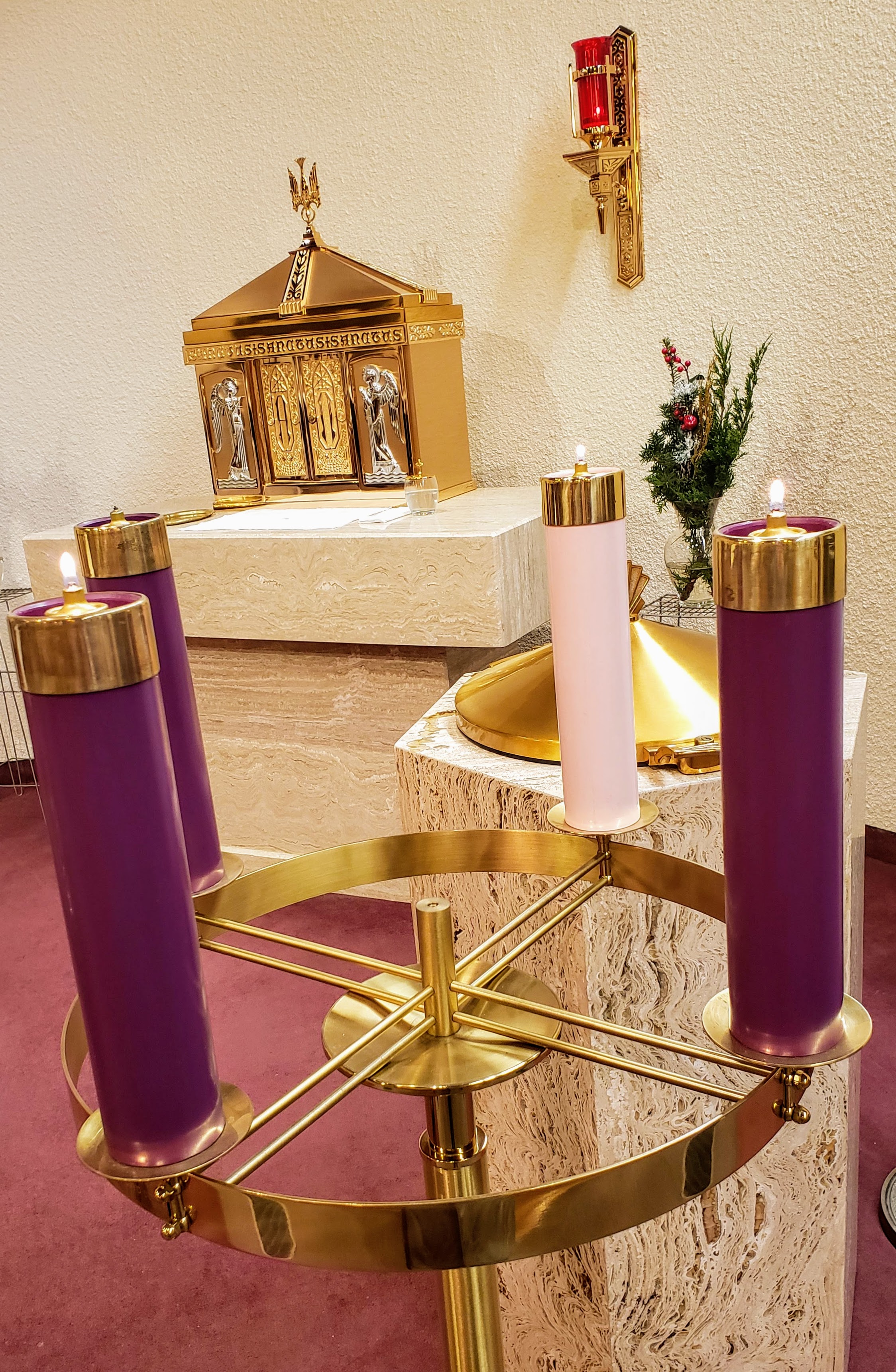 Third week Advent wreath, 2 purple candles lit, 1 pink candle lit