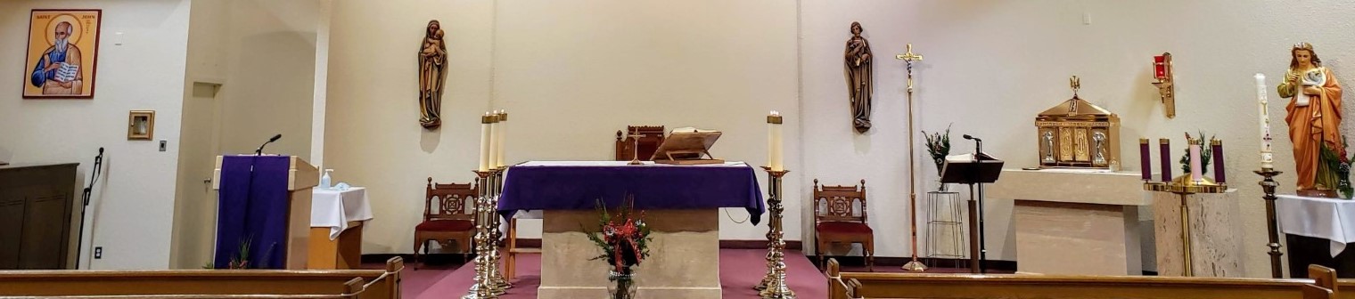 a cropped view of the sanctuary, with purple advent linens