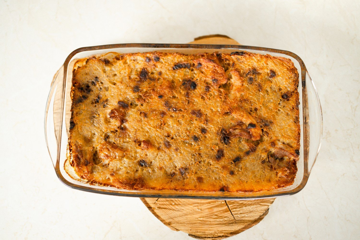 A casserole with crumb topping in a glass rectangular dish