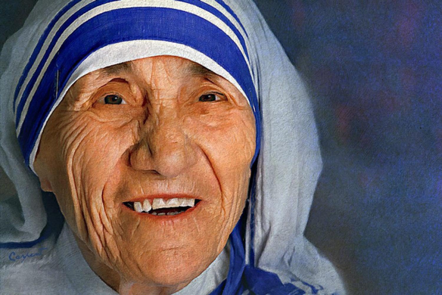 A picture of St. Teresa of Calcutta smiling and wearing her white and blue habit