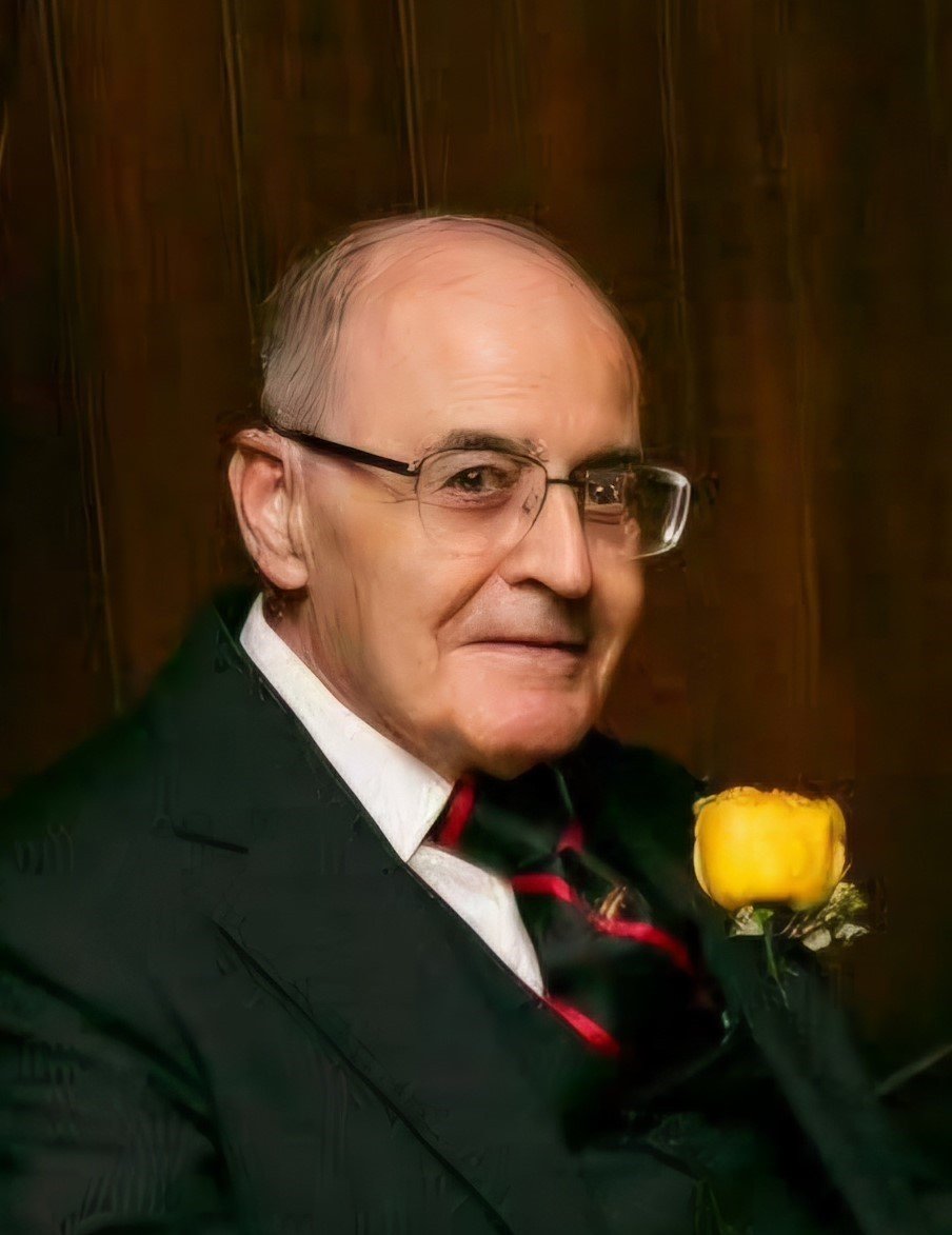 Longtime Parishioner in suite with flower