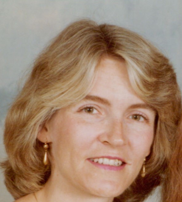 Younger smiling lady with blond hair